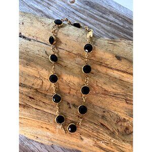 Swarovski Black Faceted Gold-Plated Bracelet Swan Logo